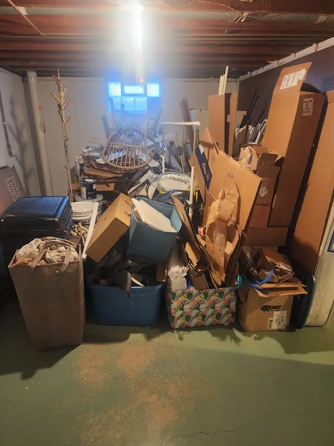 Roll-off dumpster container at job site for Construction Dumpster Rental in Colchester